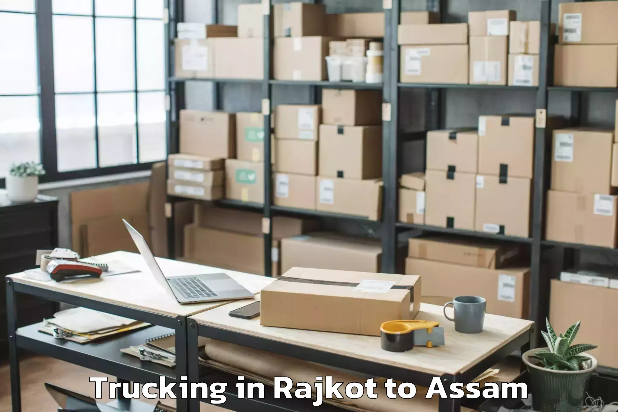 Easy Rajkot to Rangapara Trucking Booking